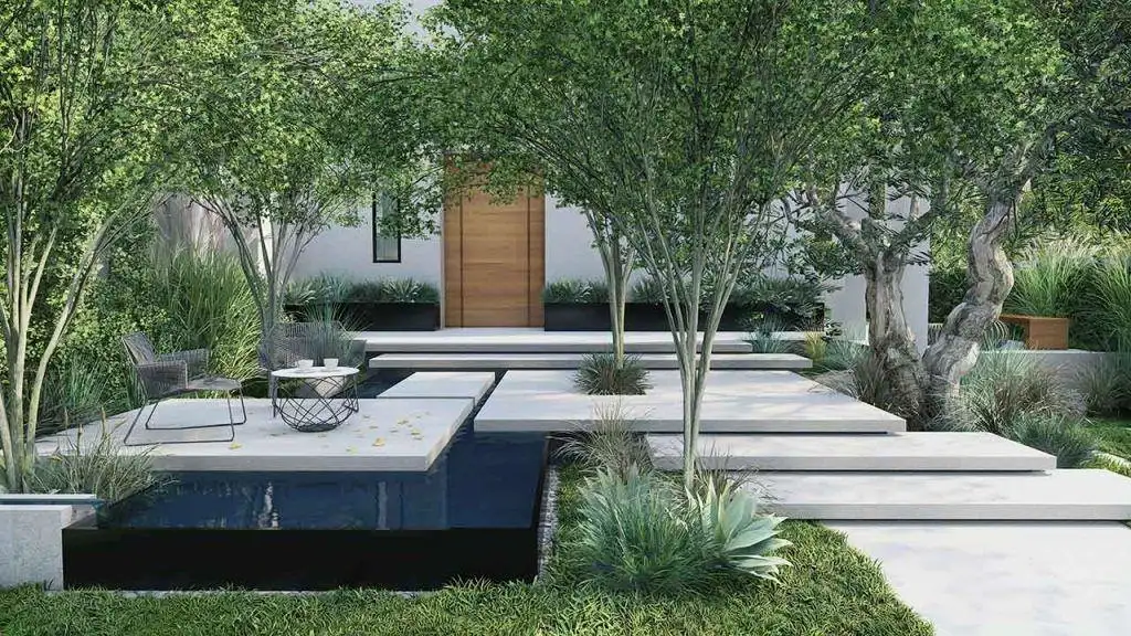 Entrance path with wide stepping stones and planted borders.